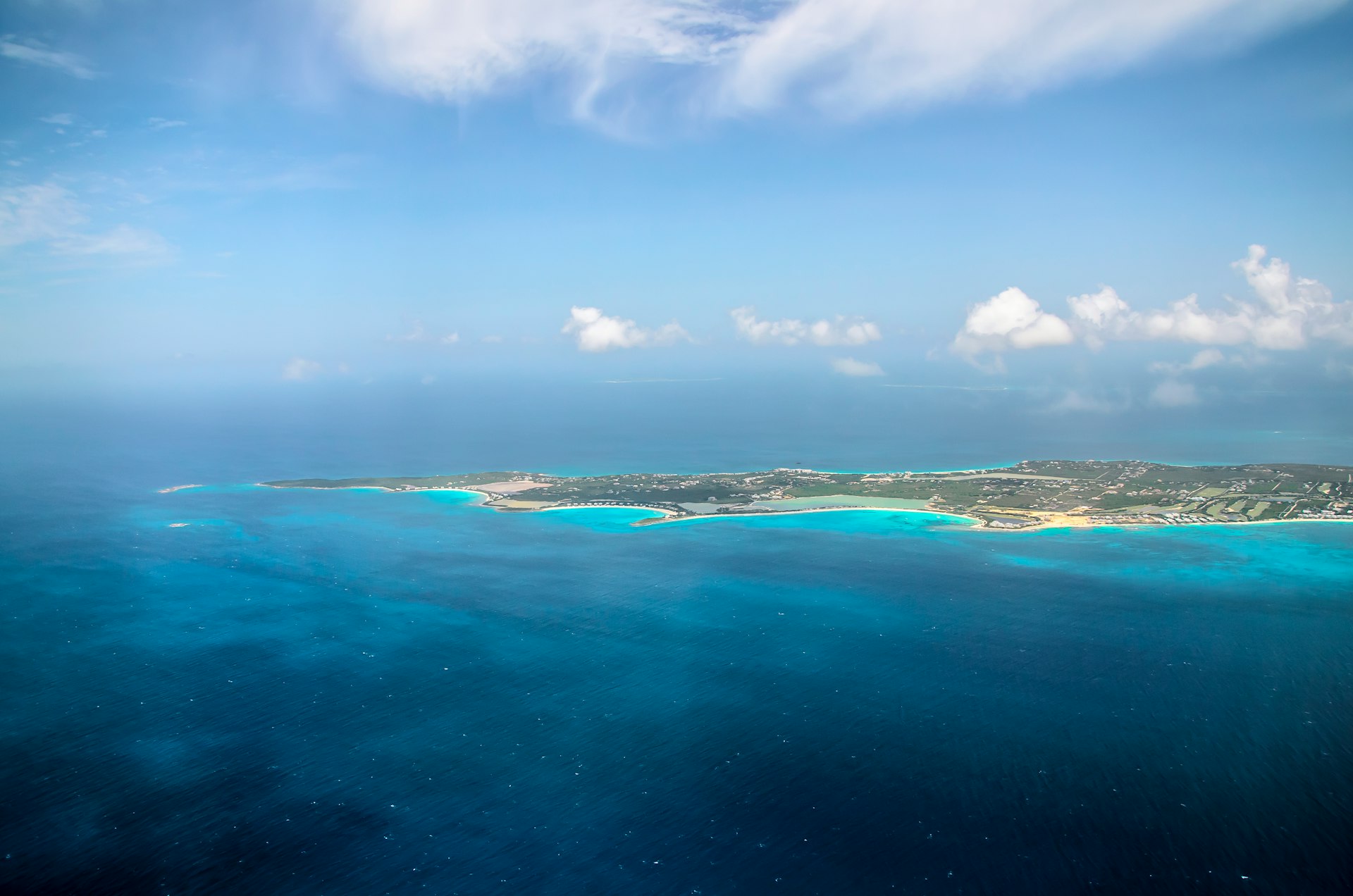 island under blue sky